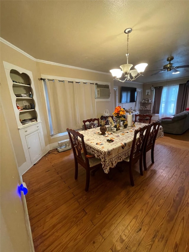 406 W Liberty Rd, Harleton, TX 75651 - dining area featuring a wall mounted air conditioner, ornamental molding, wood finished floors, and a chandelier