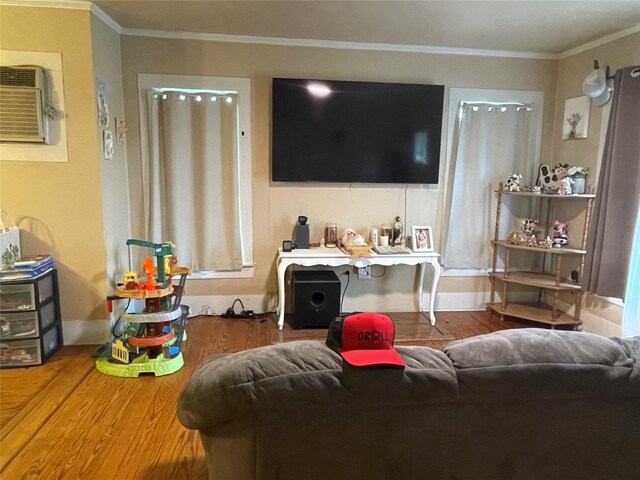 406 W Liberty Rd, Harleton, TX 75651 - living area with wood finished floors, crown molding, and baseboards