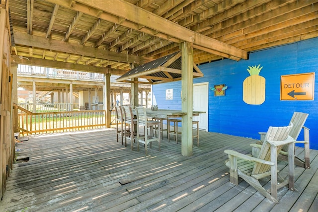 wooden deck with outdoor dining area