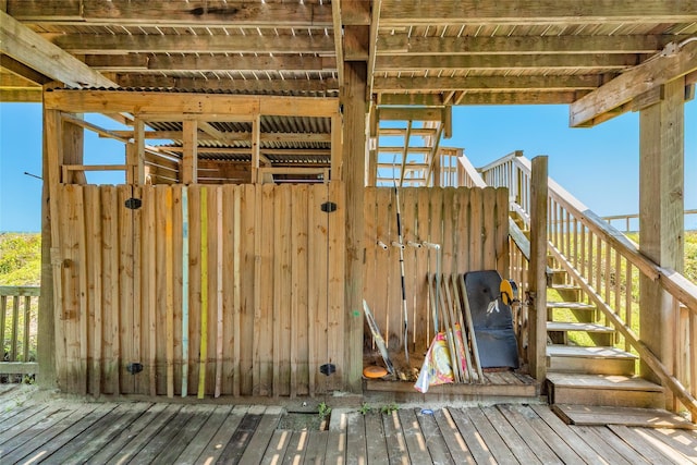 wooden terrace featuring stairway