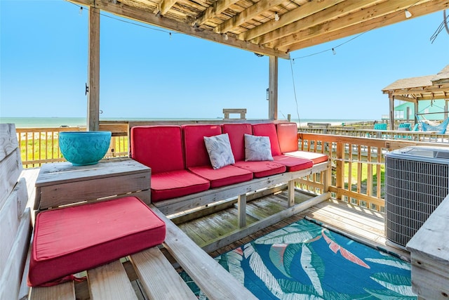 deck featuring a water view and cooling unit