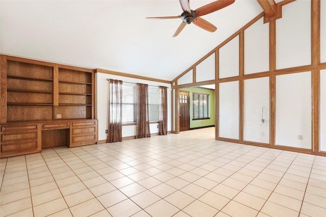 2327 Brookdale Dr, Kingwood, TX 77339 - unfurnished living room with high vaulted ceiling, ceiling fan, light tile patterned floors, and baseboards