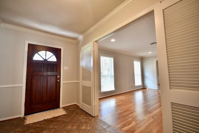 5718 Benning Dr, Houston, TX 77096 - foyer entrance featuring crown molding, tile patterned floors, baseboards, and recessed lighting