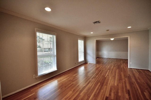 5718 Benning Dr, Houston, TX 77096 - spare room featuring crown molding, wood finished floors, baseboards, and recessed lighting