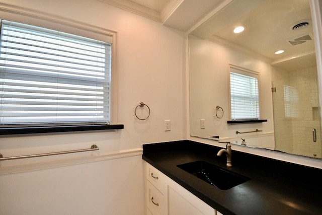 5718 Benning Dr, Houston, TX 77096 - full bathroom featuring crown molding, a shower stall, and vanity