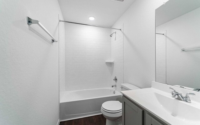 3109 Aqua Wave Dr, Texas City, TX 77568 - full bathroom with wood finished floors, vanity, toilet, and shower / bath combination