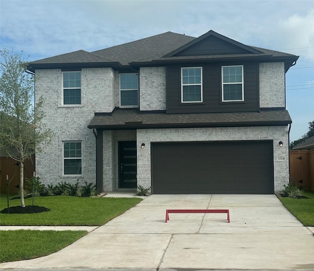 13309 Dalvay Beach Dr, Texas City, TX 77568 - view of front of property featuring driveway, a garage, and roof with shingles