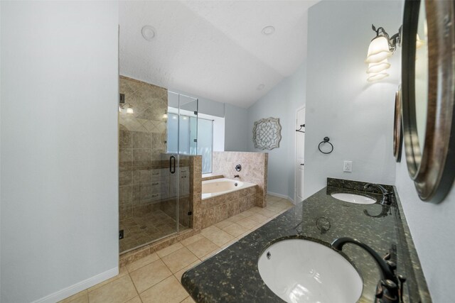 full bath with a bath, a shower stall, tile patterned floors, and a sink