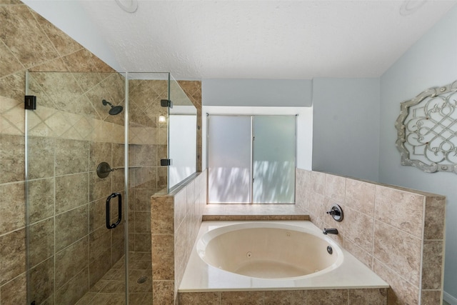 full bathroom with a jetted tub and a shower stall