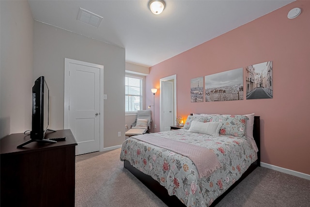 bedroom with visible vents, baseboards, and carpet floors