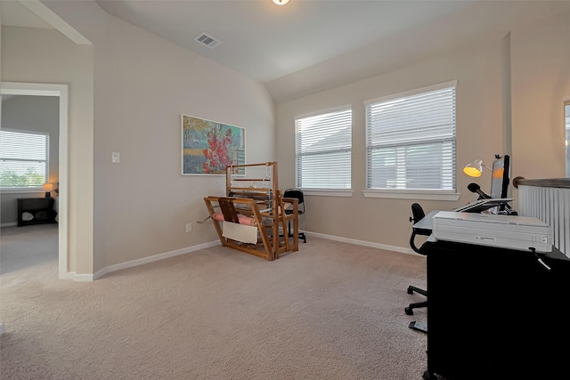 office featuring light carpet, a wealth of natural light, and baseboards