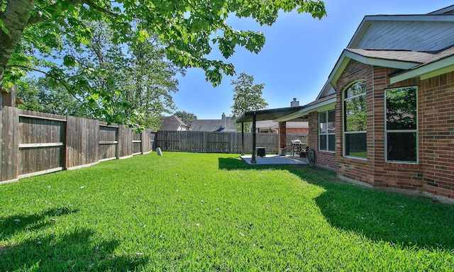 12506 Opal Valley Dr, Tomball, TX 77377 - view of yard with a patio area and a fenced backyard