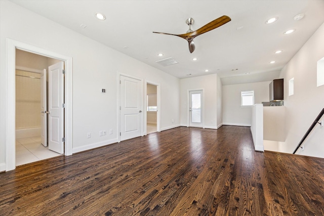 unfurnished living room featuring visible vents, baseboards, recessed lighting, wood finished floors, and ceiling fan