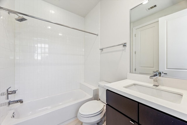 bathroom with tub / shower combination, visible vents, toilet, and vanity