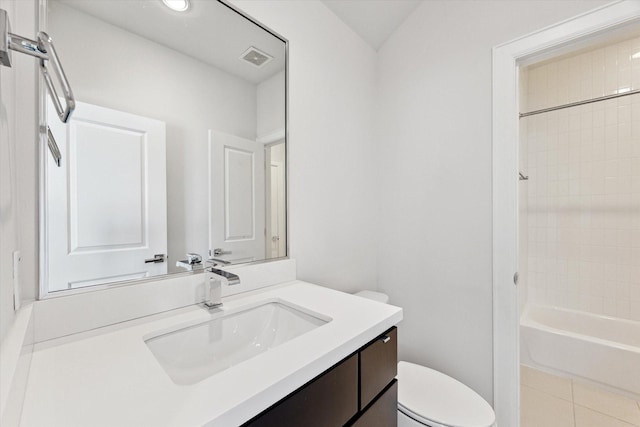 bathroom with visible vents, toilet, vanity, and bathtub / shower combination