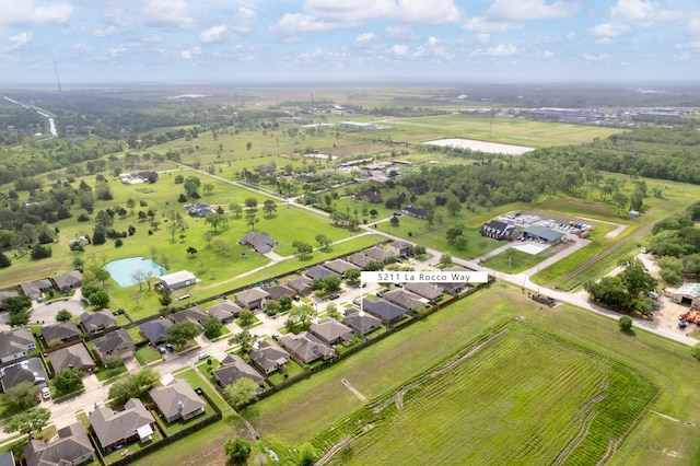 bird's eye view with a rural view and a water view
