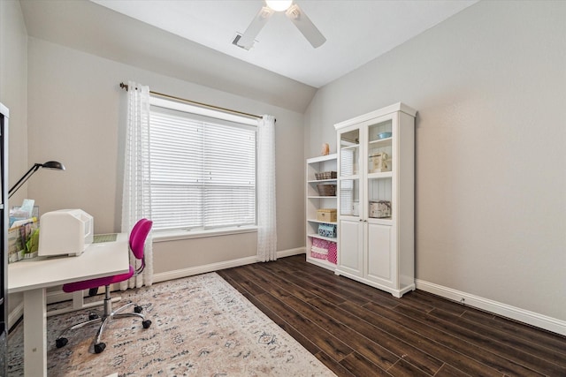office featuring baseboards, ceiling fan, dark wood-style flooring, and lofted ceiling
