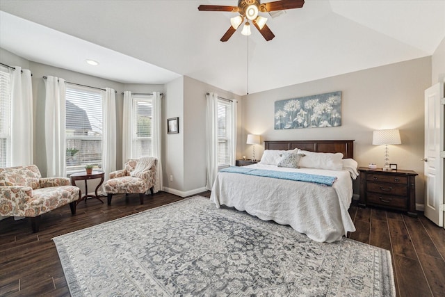 bedroom with baseboards, dark wood finished floors, ceiling fan, and vaulted ceiling