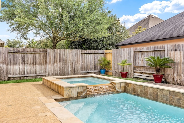 view of pool with a fenced in pool, a fenced backyard, and an in ground hot tub