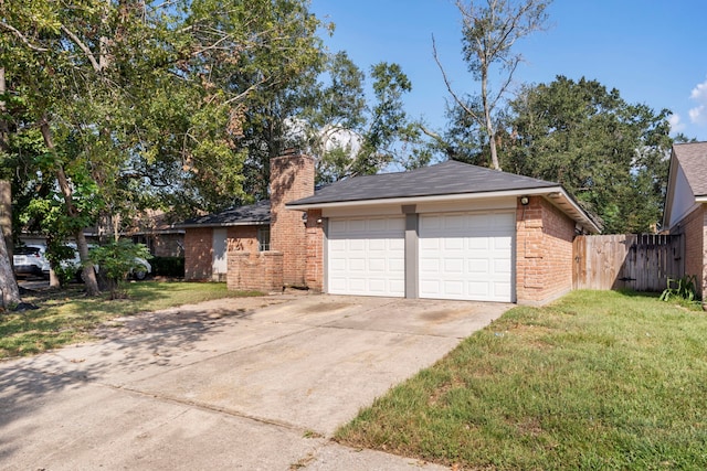 19822 Brightstone Dr, Humble, TX 77338 - detached garage featuring driveway and fence