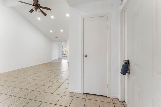 19822 Brightstone Dr, Humble, TX 77338 - hallway with baseboards, recessed lighting, light tile patterned flooring, and lofted ceiling