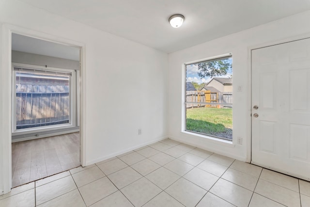19822 Brightstone Dr, Humble, TX 77338 - interior space with light tile patterned floors and baseboards
