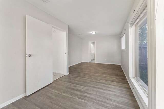 19822 Brightstone Dr, Humble, TX 77338 - spare room with baseboards and wood finished floors