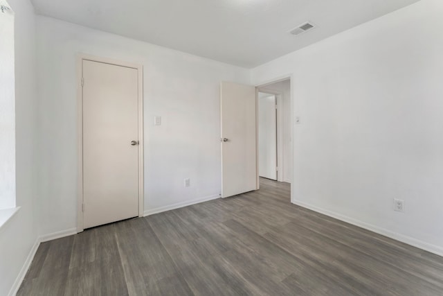 19822 Brightstone Dr, Humble, TX 77338 - unfurnished room featuring visible vents, baseboards, and wood finished floors