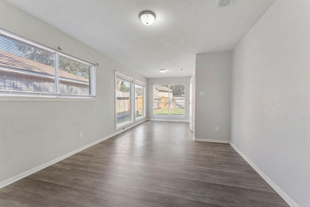 19822 Brightstone Dr, Humble, TX 77338 - unfurnished room featuring wood finished floors, baseboards, and visible vents