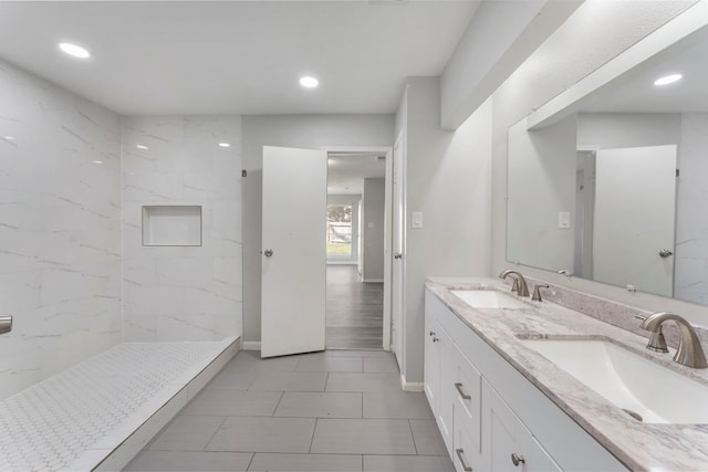 19822 Brightstone Dr, Humble, TX 77338 - full bathroom featuring a sink, walk in shower, double vanity, and recessed lighting