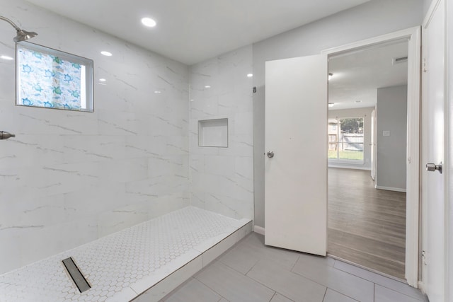 19822 Brightstone Dr, Humble, TX 77338 - full bath with visible vents, baseboards, and walk in shower