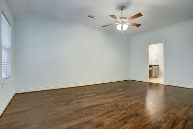 unfurnished room featuring baseboards, a ceiling fan, dark wood-style floors, and ornamental molding