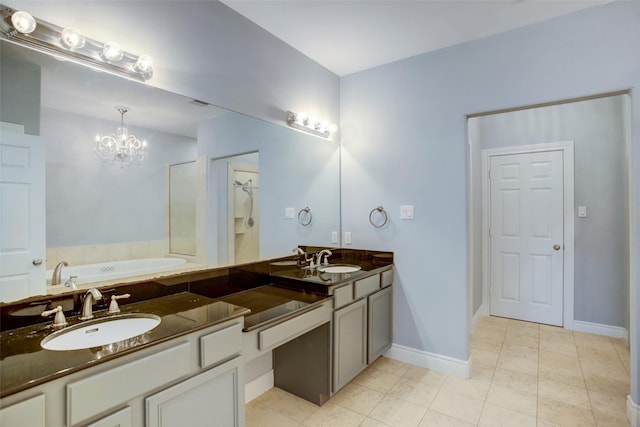 bathroom featuring a chandelier, a sink, a bath, and a shower