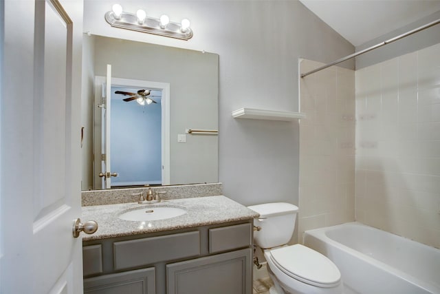 bathroom featuring vanity, ceiling fan, bathtub / shower combination, and toilet