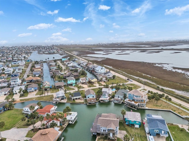aerial view featuring a residential view and a water view