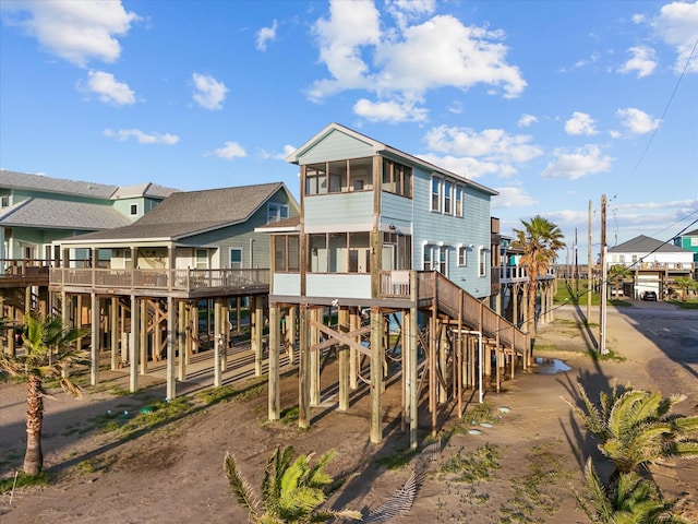 rear view of property with a residential view