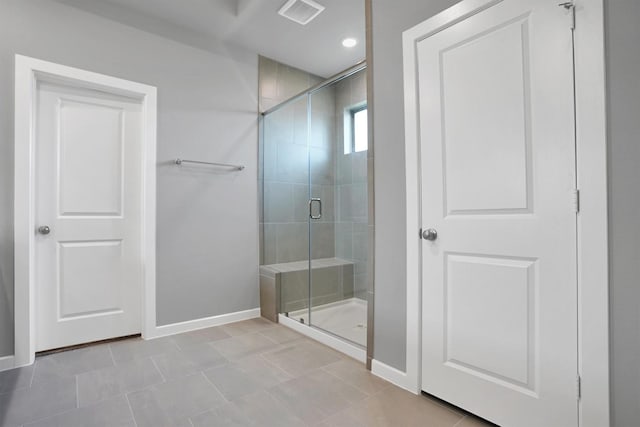 full bathroom featuring recessed lighting, tile patterned flooring, visible vents, baseboards, and a stall shower