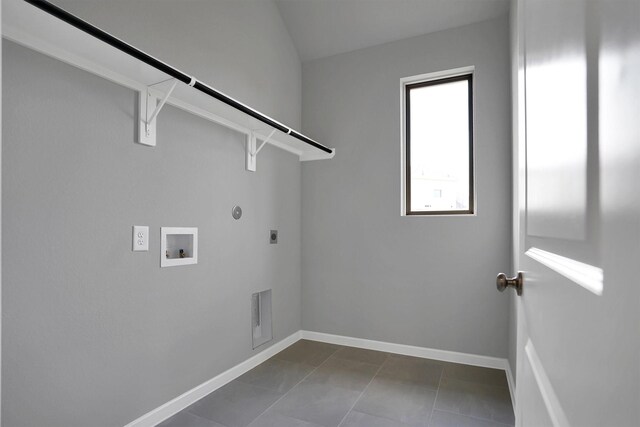 clothes washing area featuring hookup for an electric dryer, baseboards, hookup for a washing machine, hookup for a gas dryer, and laundry area