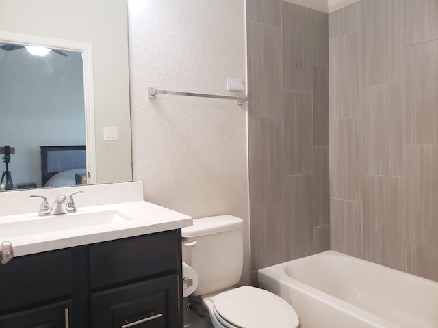 bathroom with connected bathroom, toilet, shower / washtub combination, and vanity