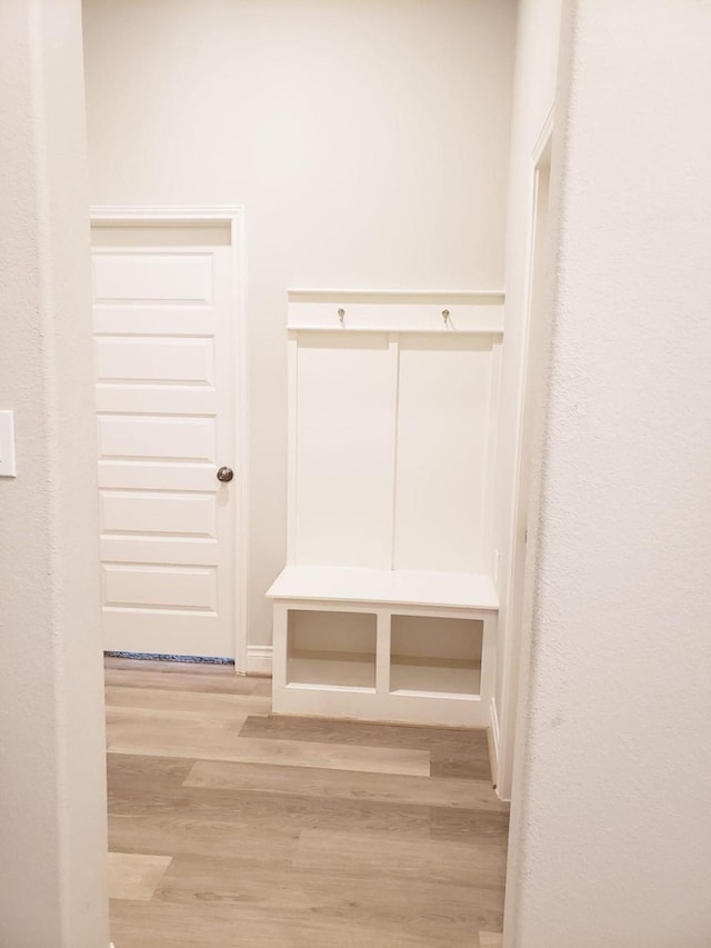mudroom featuring light wood-style floors