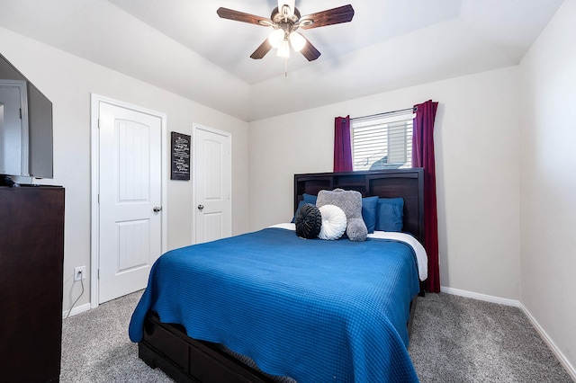 bedroom featuring baseboards, ceiling fan, and carpet