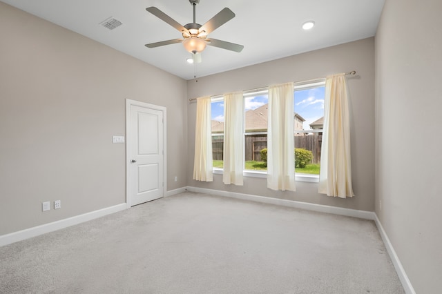 10723 Bridgeport Path Ct, Missouri City, TX 77459 - spare room with ceiling fan, light carpet, and baseboards