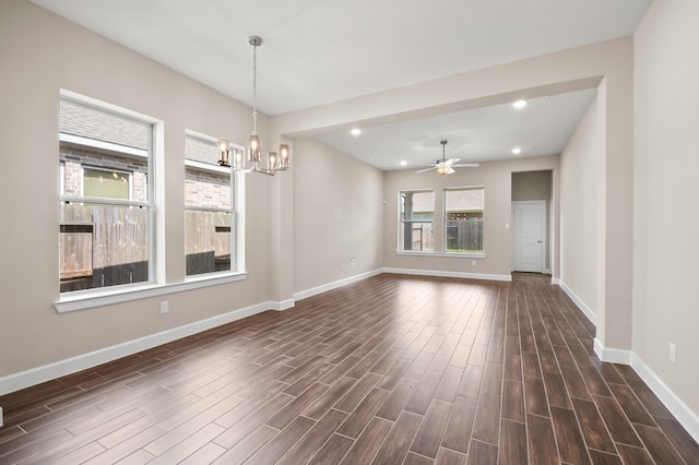 10723 Bridgeport Path Ct, Missouri City, TX 77459 - interior space featuring baseboards, recessed lighting, dark wood-style flooring, and ceiling fan with notable chandelier