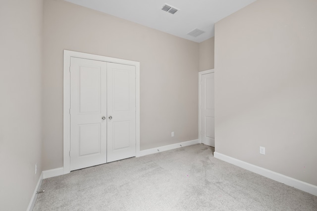 10723 Bridgeport Path Ct, Missouri City, TX 77459 - unfurnished bedroom with baseboards, visible vents, carpet, and a closet