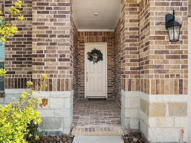 1676 Happy Valley St, Montgomery, TX 77316 - doorway to property featuring brick siding