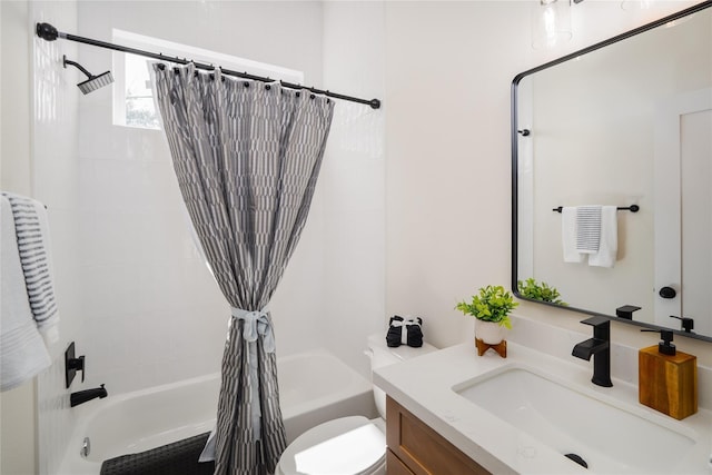 bathroom with toilet, vanity, and shower / bath combination with curtain