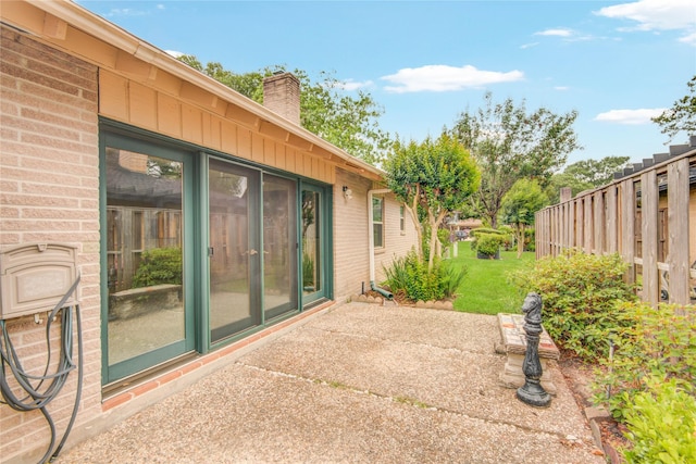 view of patio with fence