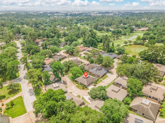 aerial view featuring a residential view, a water view, and golf course view