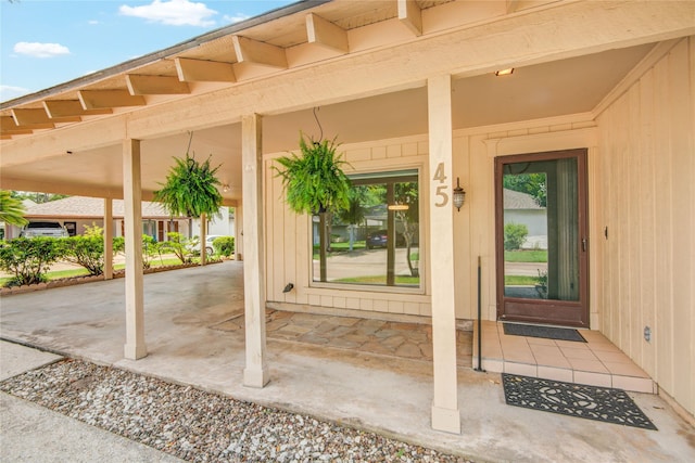 45 Champions Colony E, Houston, TX 77069 - doorway to property with covered porch