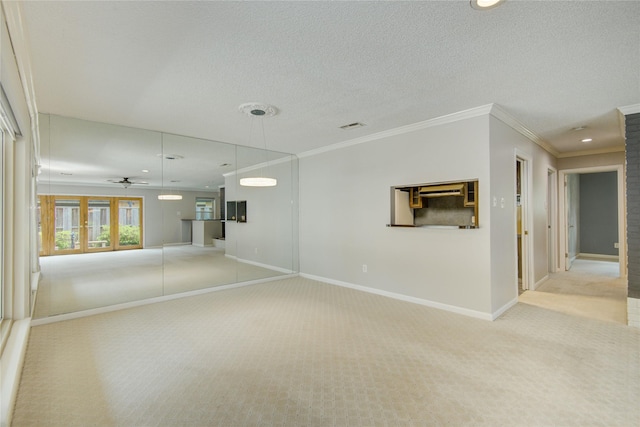 carpeted spare room with baseboards, ornamental molding, a ceiling fan, and recessed lighting